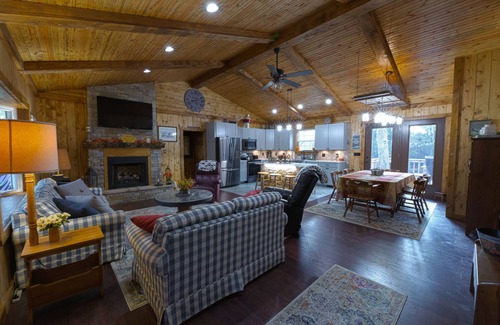 Winchester Cabin | Rustic Cabin with modern amenities and 1 acre stocked Fishing Lake !