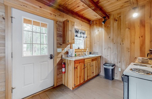 Dexter Cabin | Rustic, lakefront cabin with floating dock, firepit & fireplace - dog-friendly