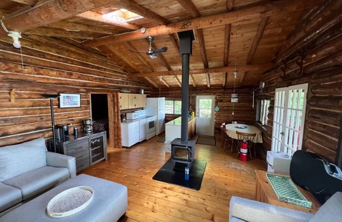 Northern Ontario Cottage | Rustic Log Cottage in Woodchuck Bay on Lake of the Woods with a Sand Beach