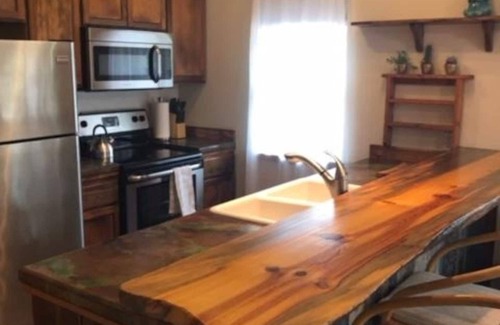 River Road Condo | Rustic, modern, and cozy condo located in central Missoula on the Milwaukee Path bike trail.