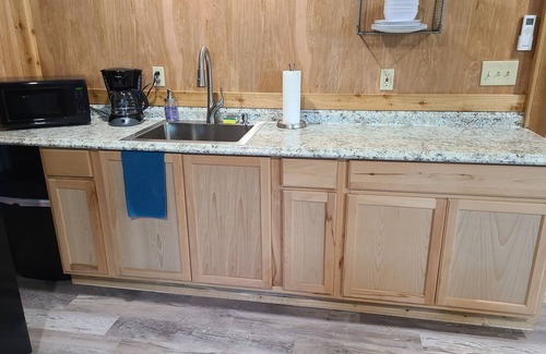 Lee County Apartment | Rustic studio country cabin w/shared pool, firepit, & outdoor kitchen
