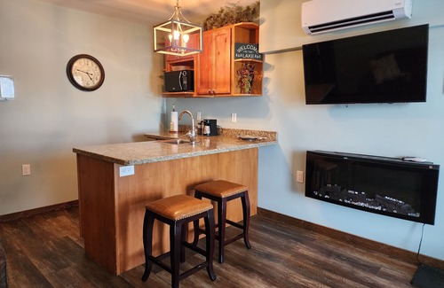 Solon Springs Apartment | Rustic Suite on the Lake: Cozy Comfort with Unmatched Sunrises.
