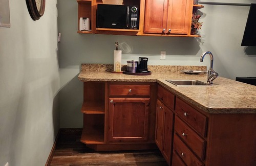 Solon Springs Apartment | Rustic Suite on the Lake: Cozy Comfort with Unmatched Sunrises.
