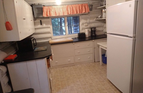 Dennysville Cottage | Rustic two-story log cottage, River-view, Pet-friendly, Downeast Maine