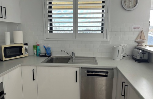North Haven Apartment | Sailies’s Retreat.nMarina Location.nWatch the sunset, boats and dolphins 🐬