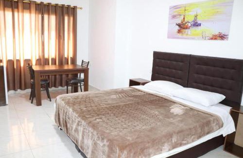 Al Jizah Apartment | Salvador Dali Apartments