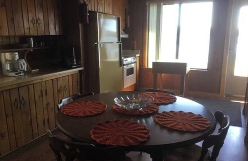 Toivola Cabin | Sandy Lake Retreat Charming 2-bedroom cabin with WiFi, AC steps from the lake!