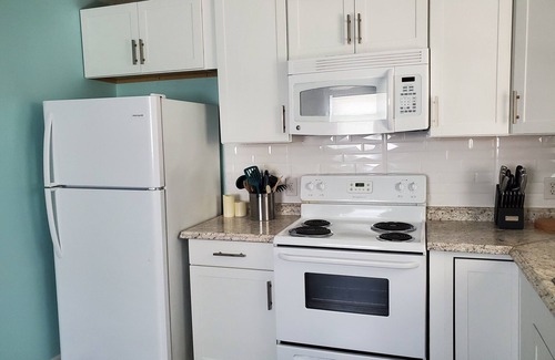 Long Beach House | Sandy Paws - A Dog-Friendly Haven with Boat Parking on Oak Island, NC