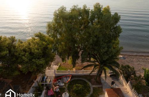 Chalcis House | Sandy Suite - seafront & luxury