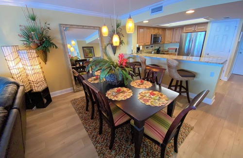 Punta Rassa Condo | Sanibel Harbour Resort732: Experience dolphin tours by day and sunset views from your private lanai.