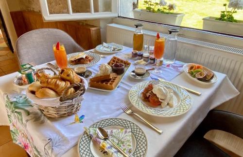 Luzille Bed & Breakfast | Sans Souci Bed and Breakfast Luxe Heated Pool and Restaurant
