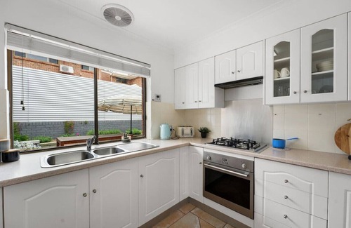 Grange House | Sapphire by the Sea - Beach Family Modern