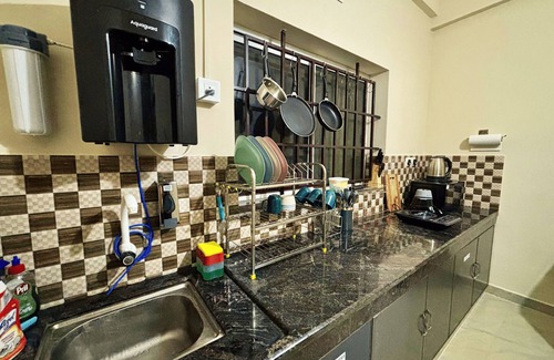 Perintalmanna Apartment | Saraa Homes - 2BHK Self Service Furnished Apt with Balcony near Kalari & MES