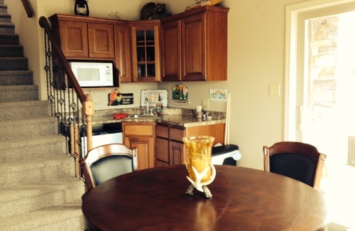 Belle House | Scenic Lakeside Chateau with Heated Pool, Hot Tub & Outdoor Kitchen-TV-Fireplace