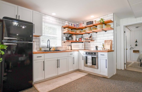 Crivitz House | Scenic, Serene Lakefront Cabin — Wood Stove