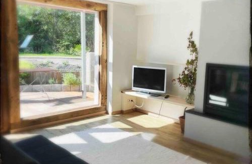 Glosingen Apartment | Schöne Wohnung mit Sonnenterrasse und Kamin