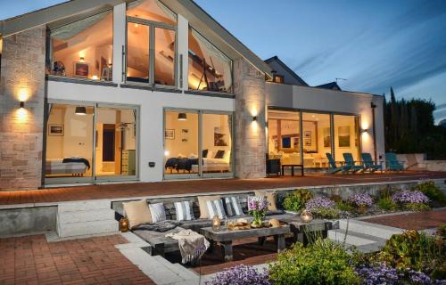 St. Levan House | SEA BREEZE - Stunning 6 Bedroom Eco Home with Sea Views