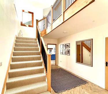 St. Levan House | SEA BREEZE - Stunning 6 Bedroom Eco Home with Sea Views