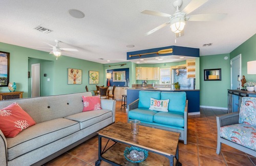 New Town Condo | SEA-NIC VIEW ~ 2 BR/2Ba Water-front views, Heated Pool Access and Dockage!