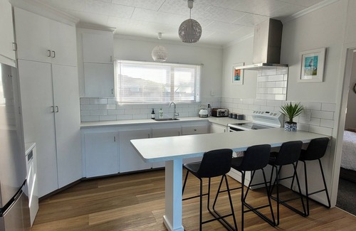 Riverton House | sea views from kitchen, dinning, master bedroom and large partly covered deck
