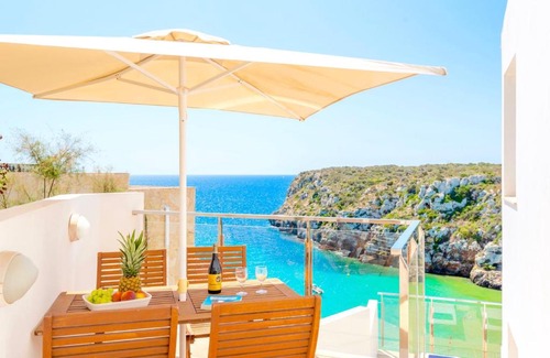 Cala en Porter Villa | Seafront Villa Bellavista with heated pool by DadoVillas