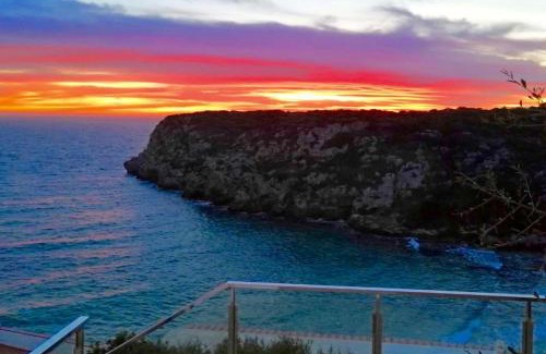 Cala en Porter Villa | Seafront Villa Bellavista with heated pool by DadoVillas
