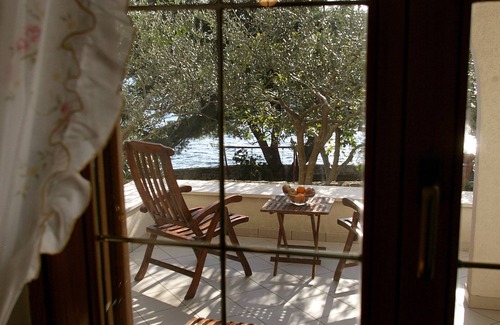 Businci Villa | Seafront villa with heated swimming pool, teak deck, open sea view, boat mooring