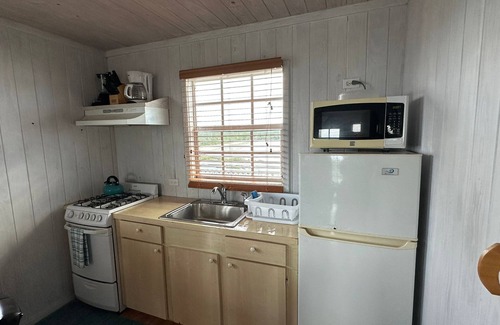 Black Point Cottage | Seashell Cottage with breathtaking views! Near Swimming Pigs.