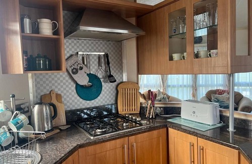 Llanrhystud House | Seaside Bliss for the Family: Spacious Caravan by the Sea, Sleeps 4, Perfect for Kids