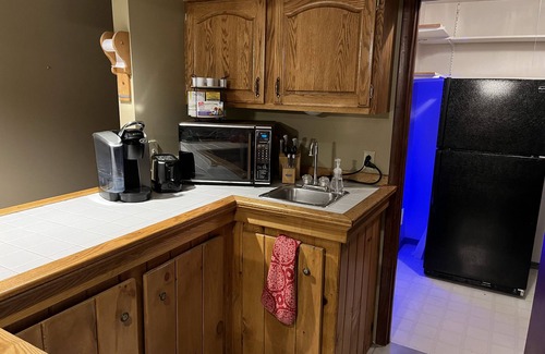 Rodman Apartment | Secluded Apartment Overlooking Ponds with Hot Tub, Fireplace and Game Room!
