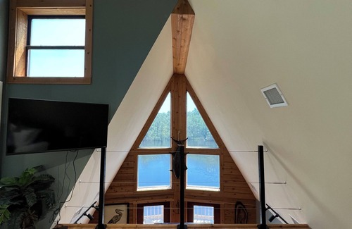 Satsuma Cabin | Secluded cabin on the water with jetski, hottub & kayak! Pets OK & early checkin