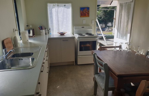 Tuateawa Cottage | Secluded Cottage in bush and garden setting and close to the sea