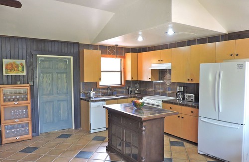 Wimberley House | Secluded gem nestled along Lone Man Creek with fireplace and long views