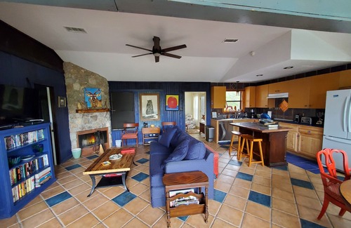 Wimberley House | Secluded gem nestled along Lone Man Creek with fireplace and long views