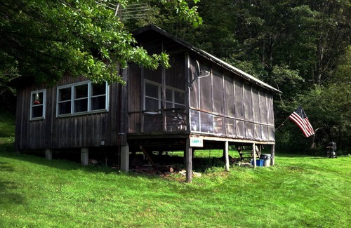 Hartwick Cabin | Secluded Hillside Property with Valley Views and Fishing Pond