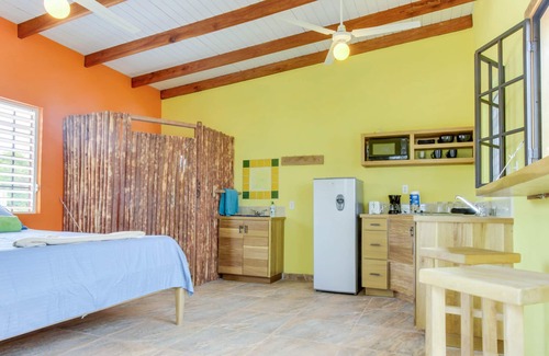 Dangriga Cabin | Secluded seaside cabana with beach access, ocean view, hammock & partial AC