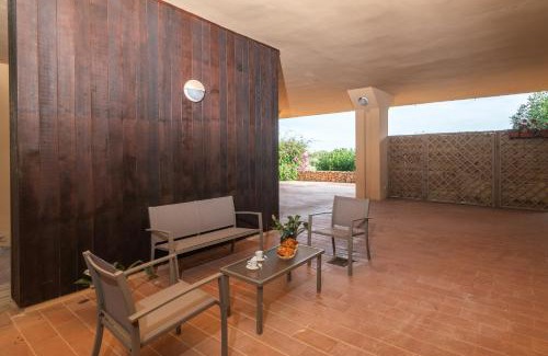 Portisco Apartment | Secret Garden House - Happy Rentals