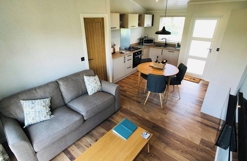 Llansantffraed Ski Chalet | Semi-detached deluxe lodge offering the perfect romantic retreat.