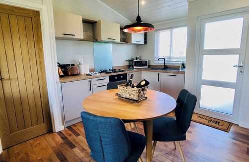 Llansantffraed Ski Chalet | Semi-detached deluxe lodge offering the perfect romantic retreat.