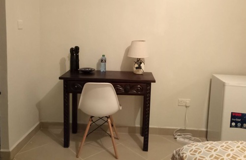 Gigiri House | Serene Green Guest Room