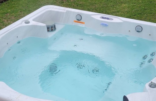 Sturgis Apartment | Serene Lake/Fishing Retreat w/outdoor hot tub and indoor Jaccuzzi