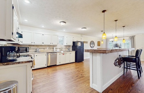 Caryville Cabin | Serene lake home with foosball, dartboard, luxe kitchen - dog friendly!