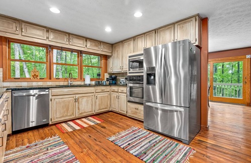 LaGrange House | Serene Lakefront Home: Private Dock, Expansive Decks, Game Room & Nature Views