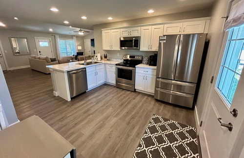 Quincy House | Serene & Modern Oasis - Newly Built, Attached Garage, Centrally Located
