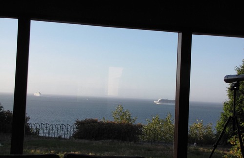 Port Angeles East House | Sit back and enjoy the spectacular view above the Strait of Juan de Fuca