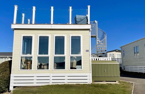 Wyke Regis House | Skydeck Holiday home with fabulous views over Chesil Beach and Portland Harbour