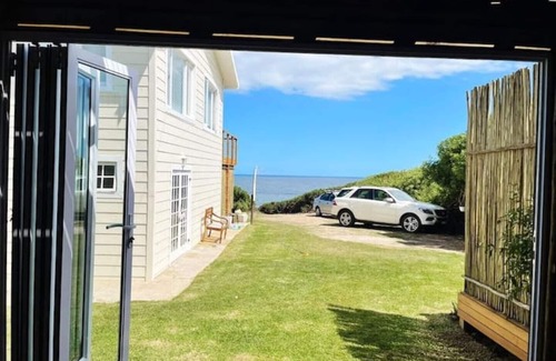 Klein Brak River Cottage | Skye Sea Cottage: Seaviews, Deck, Fireplace, Wifi
