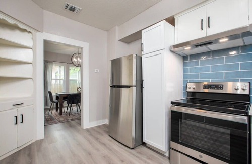 Eastside Promise Neighborhood House | Sleek Dignowity Hill House with King Beds