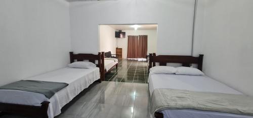 Siquirres Apartment | Sleep&Go! Cabina Familiar con 5 camas - Siquirres centro