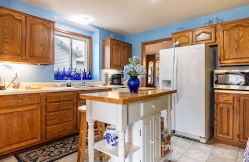 Lawrence House | Sleeps 12! Main Level Primary Suite - Beautiful Backyard Oasis!
